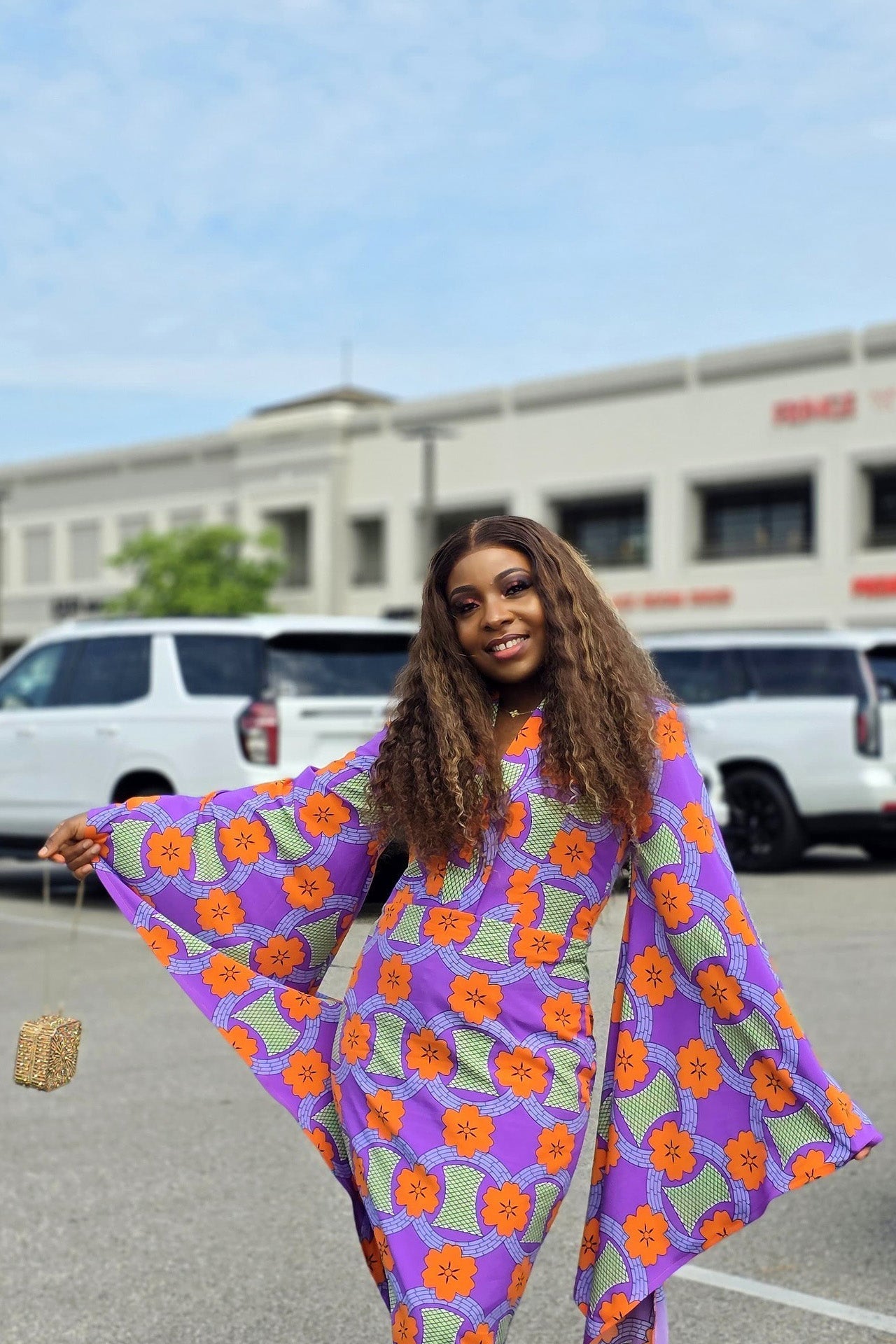 Vibrant Ankara Bell-Sleeve Fitted Maxi Dress